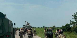 Troops receive surrendered suspected terrorist member from CDF in Borno